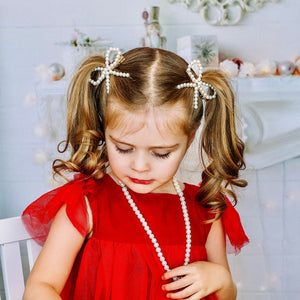 Pearl Bow with a Gold Clip